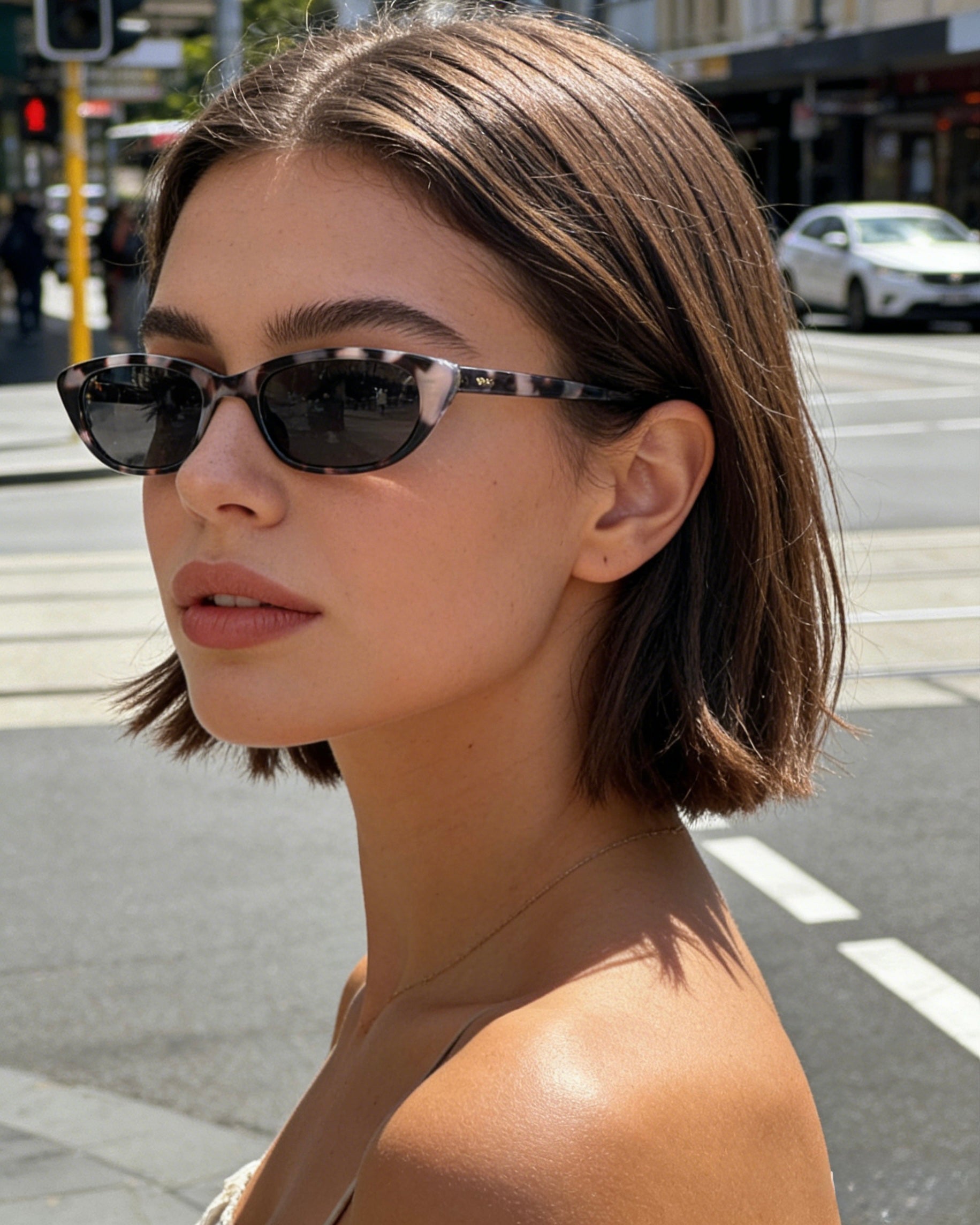 Pink Baby The Indie smoky sunglasses with tinted lenses and black frame, stylish eyewear for sun protection.