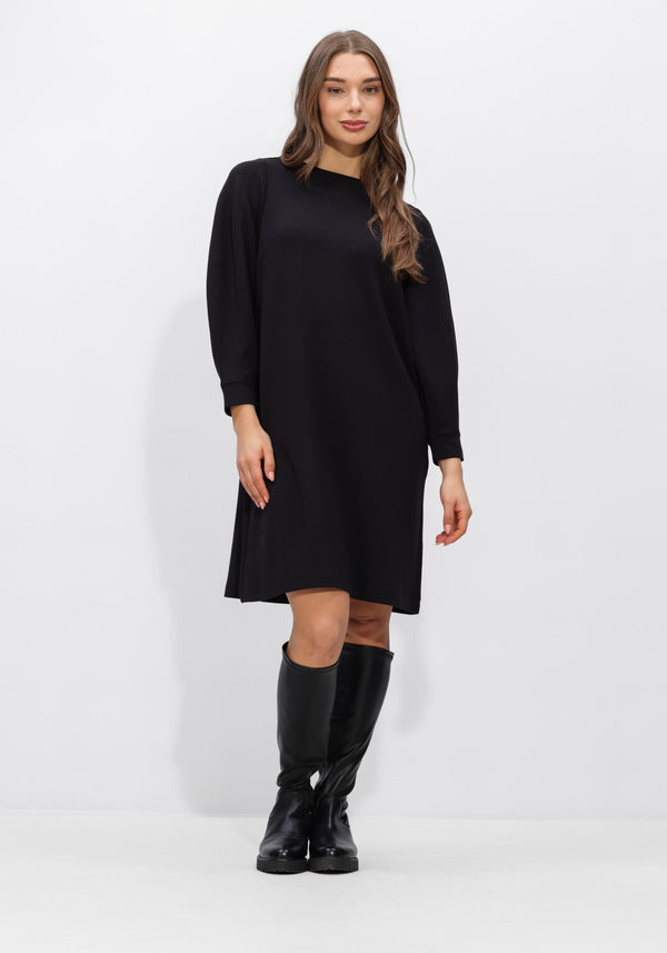 Black Helena long-sleeve shift dress by Pink Baby displayed on a hanger with a simple background.