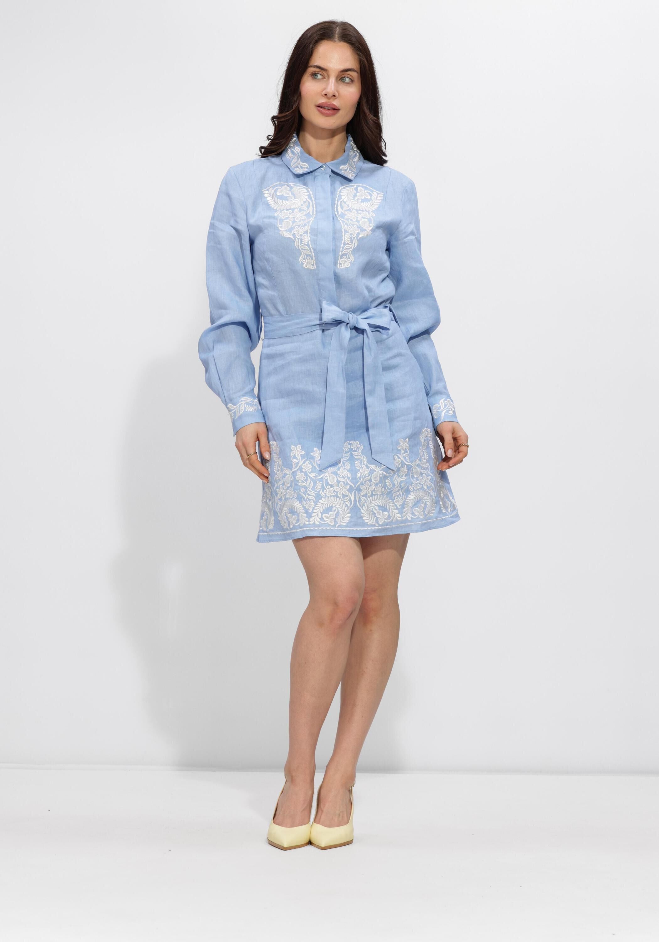 Light blue Isabella embroidered belted shirt dress by Pink Baby, featuring detailed embroidery and a waist belt.