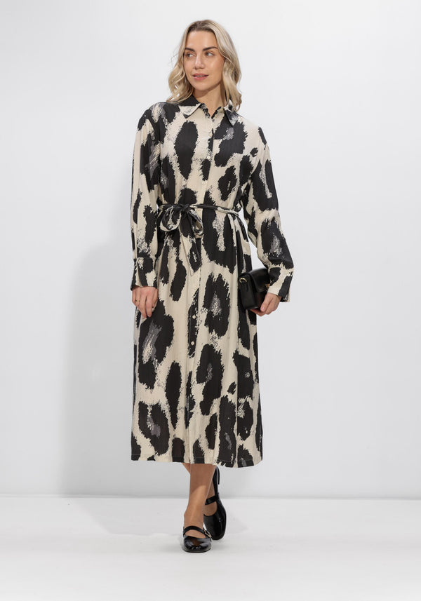 Pink Baby Massy abstract print belted shirt dress in black and beige, featuring a collar, long sleeves, and a waist tie.