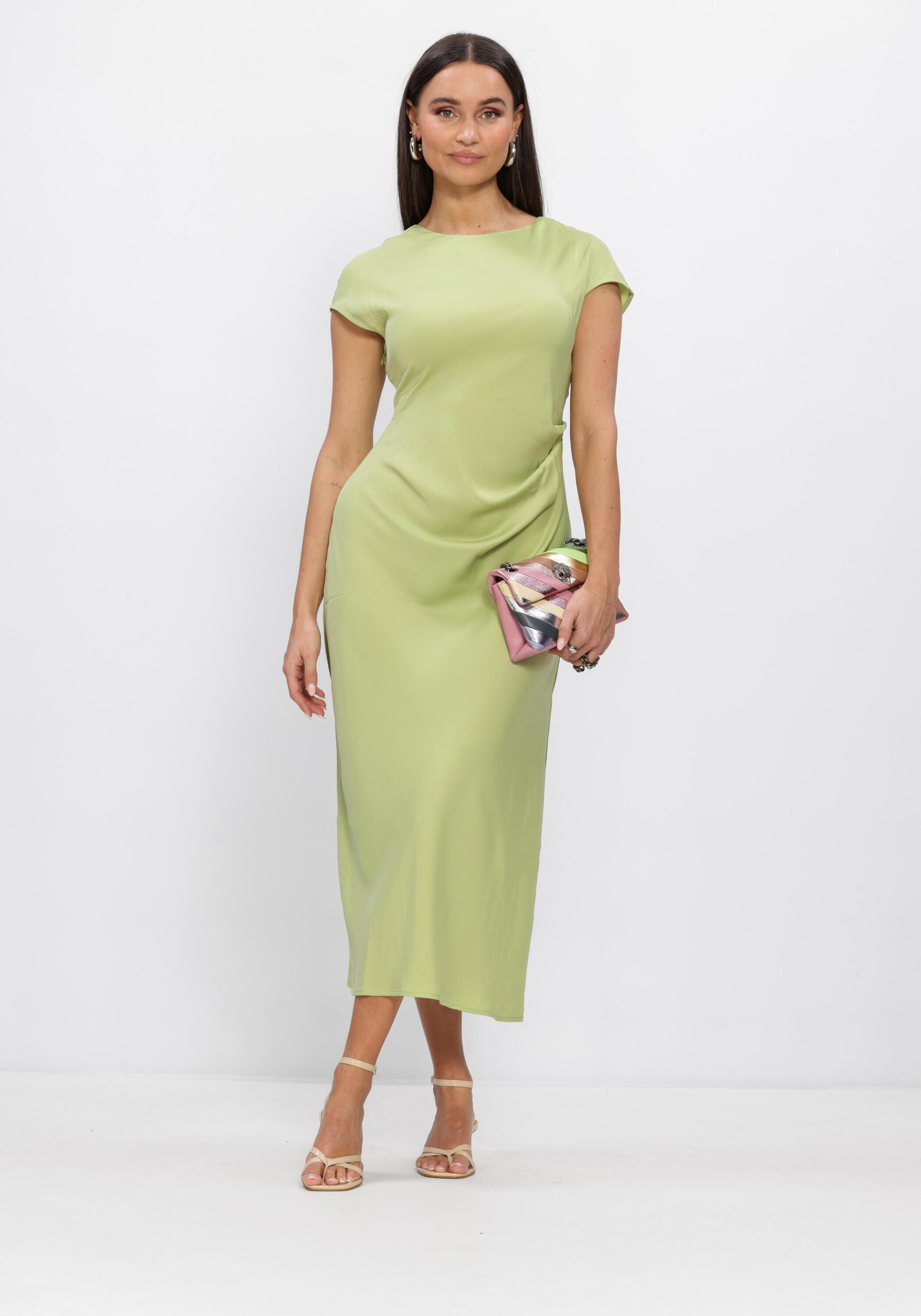 Pink Baby Amalia open-back satin midi dress in sage green, featuring a flowing design and elegant open-back detail.