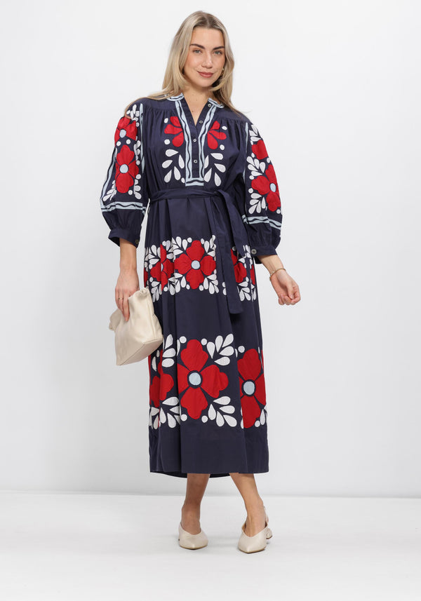 Pink Baby Elena navy floral embroidered midi dress with delicate embroidery and a flowing silhouette, designed for elegant occasions.
