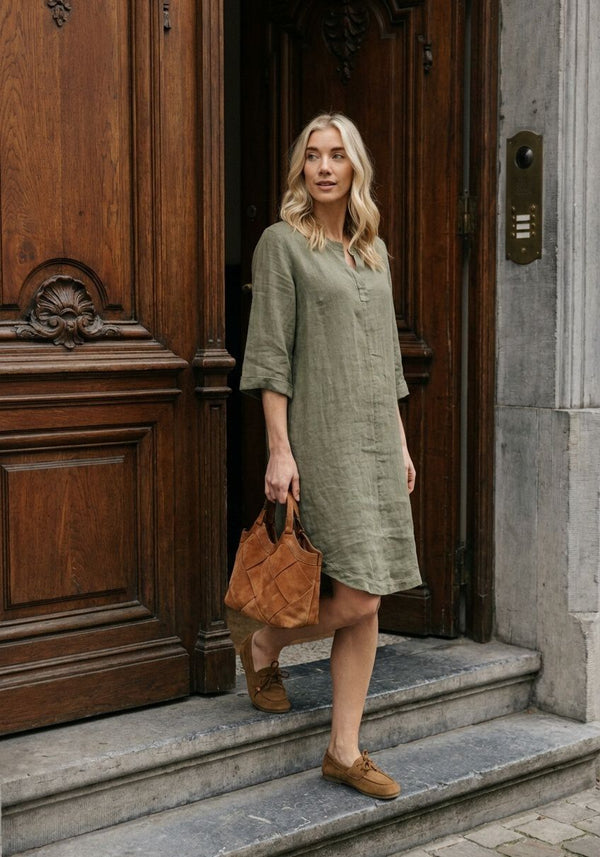 Olive green Sabrina linen midi tunic dress by Pink Baby, showing its relaxed fit and lightweight fabric on a mannequin.