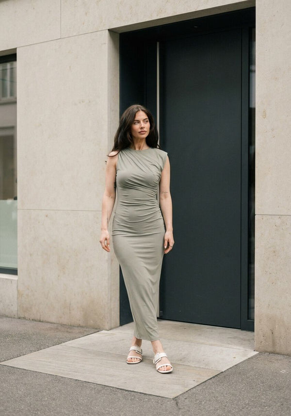 Pink Baby Elisana Draped Maxi Dress in sage grey, flowing fabric with elegant draping and a sleeveless design.