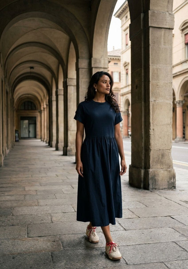 Pink Baby Allegra gathered midi dress in midnight navy, featuring a sleeveless design and elegant gathered details.