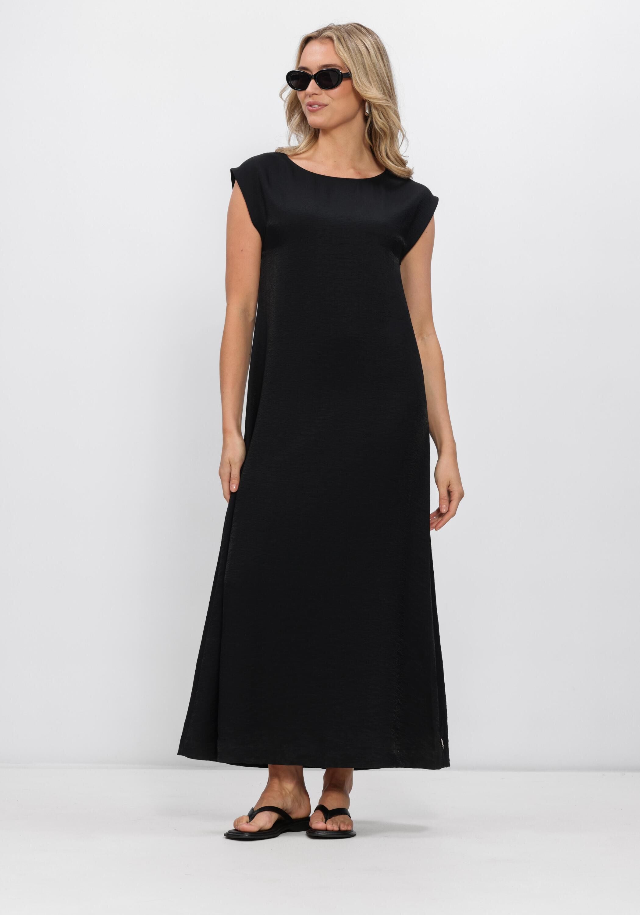 Black Cecil fluid cap-sleeve maxi dress by Pink Baby, featuring a flowing fabric and elegant design, shown on a model.