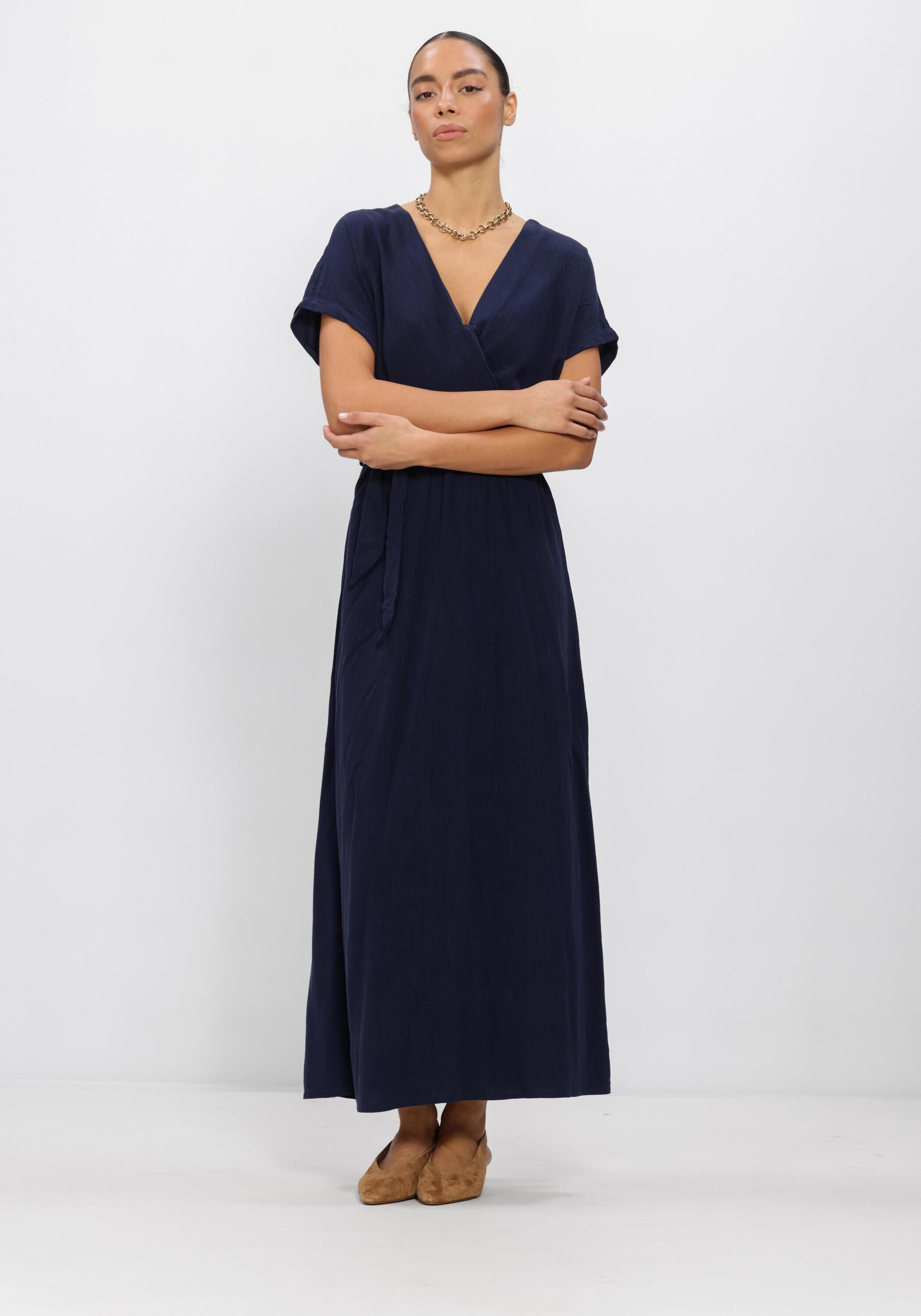 Pink Baby Rosalia belted wrap maxi dress in navy, featuring a flowing fabric, V-neckline, and waist tie for a stylish, elegant look.