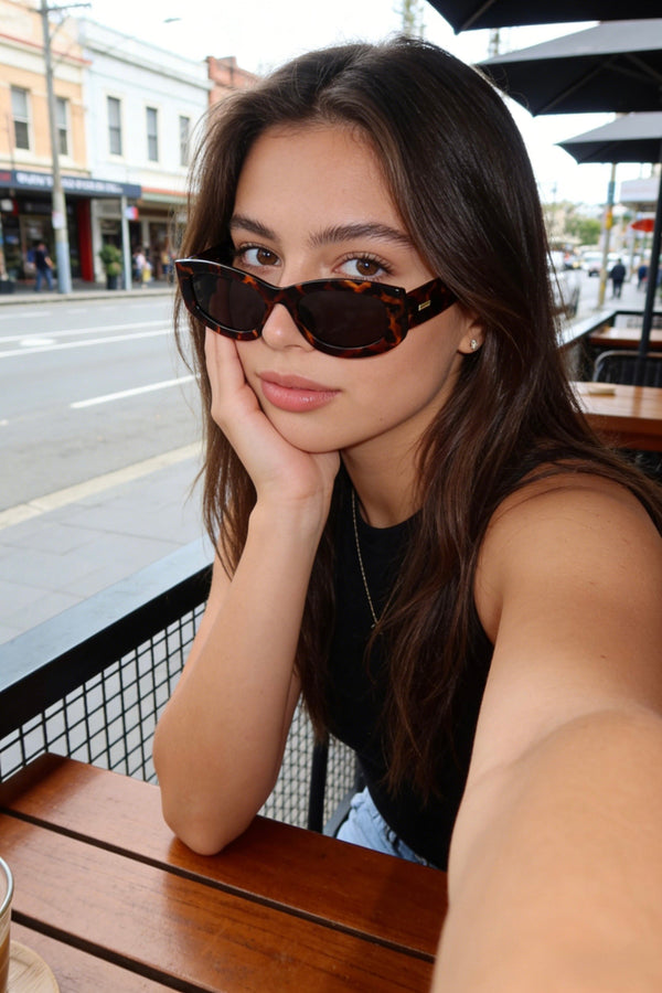 Pink Baby The Moxie sunglasses with stylish frames and tinted lenses, perfect for sun protection and fashion statements.