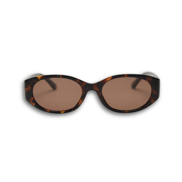 Pink Baby Kairo sunglasses with round frames and tinted lenses, stylish and protective for sunny days.