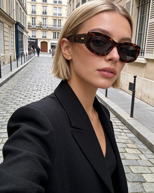 Pink Baby The Moxie sunglasses with stylish frames and tinted lenses, perfect for trendy sun protection.