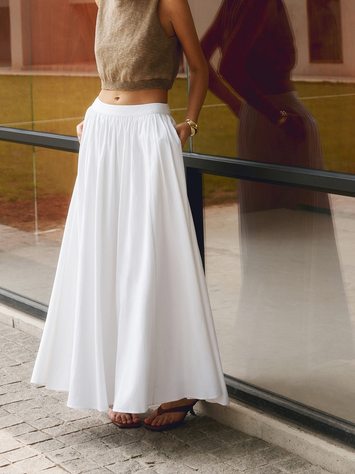 Pink Baby linen pleated maxi skirt with flowing fabric and a high waist, perfect for casual or summer outfits.