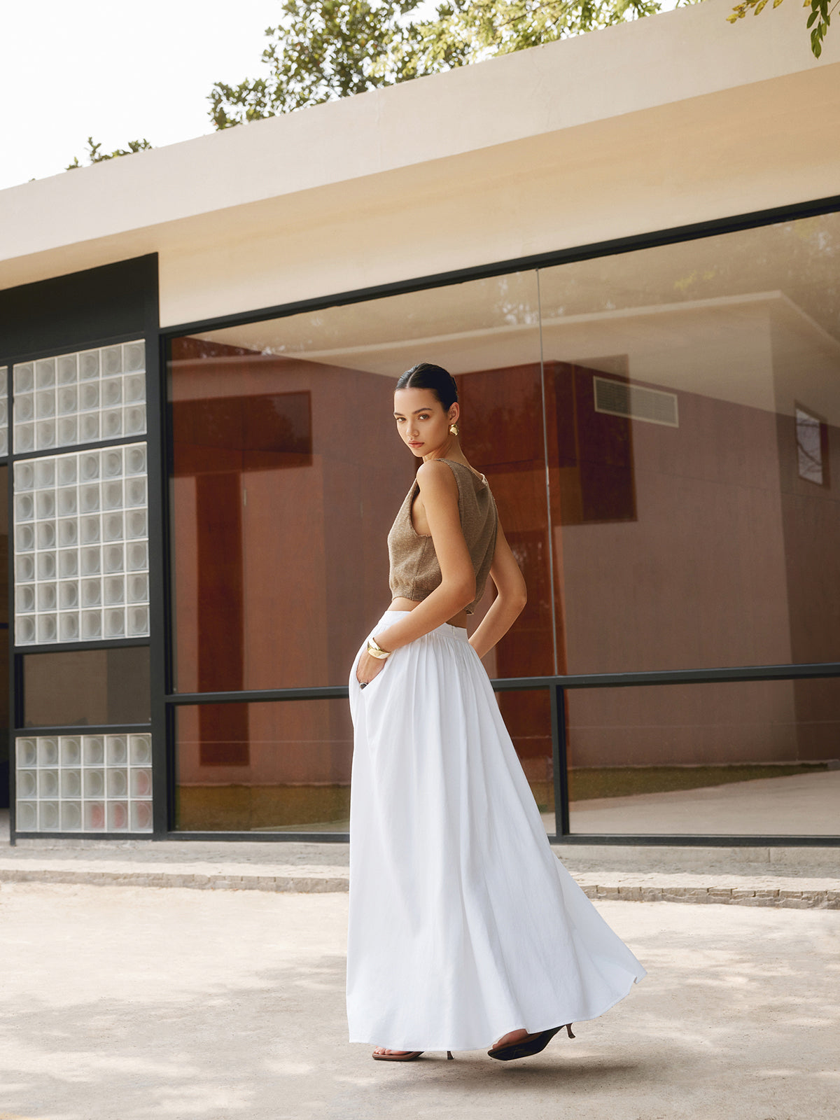 Pink Baby linen pleated maxi skirt with flowing fabric and elegant design, perfect for casual and dressy occasions.