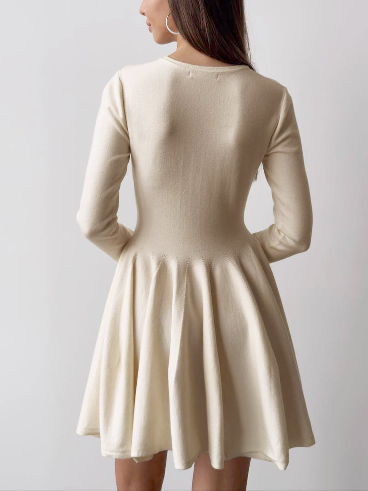 Pink Baby plain pleated sweater short dress with long sleeves and a fitted waist, styled for casual or semi-formal wear.