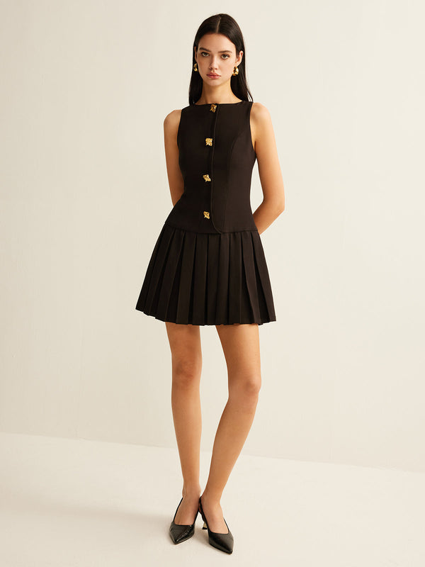 Pink Baby Metal-Button Pleated Tank Dress, sleeveless with metal buttons and a flowy pleated design, displayed on a hanger.