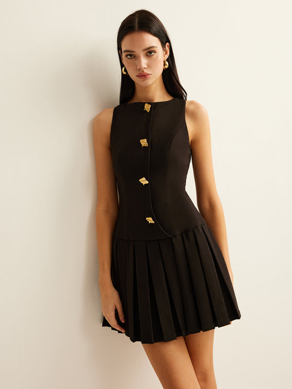 Pink Baby metal-button pleated tank dress featuring a sleeveless design and a flowing, lightweight fabric.