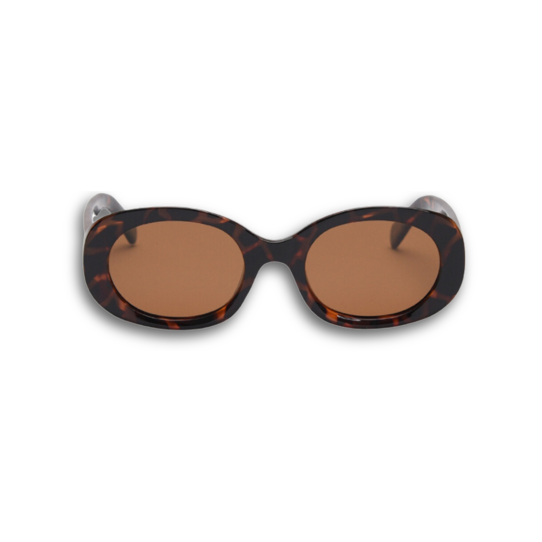 Pink Baby The Flynn tortoiseshell sunglasses with round frames and dark tinted lenses, stylish and protective eyewear for sunny days.