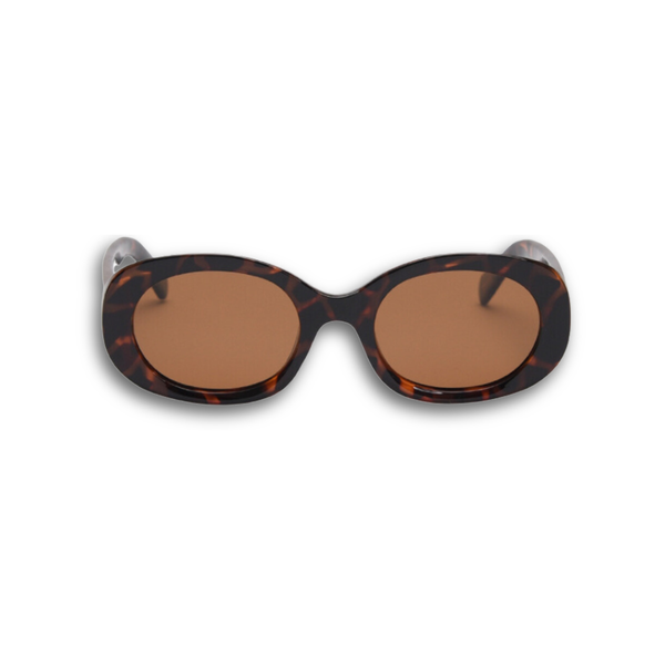 Pink Baby The Flynn tortoiseshell sunglasses with round frames and dark tinted lenses, stylish and protective eyewear for sunny days.