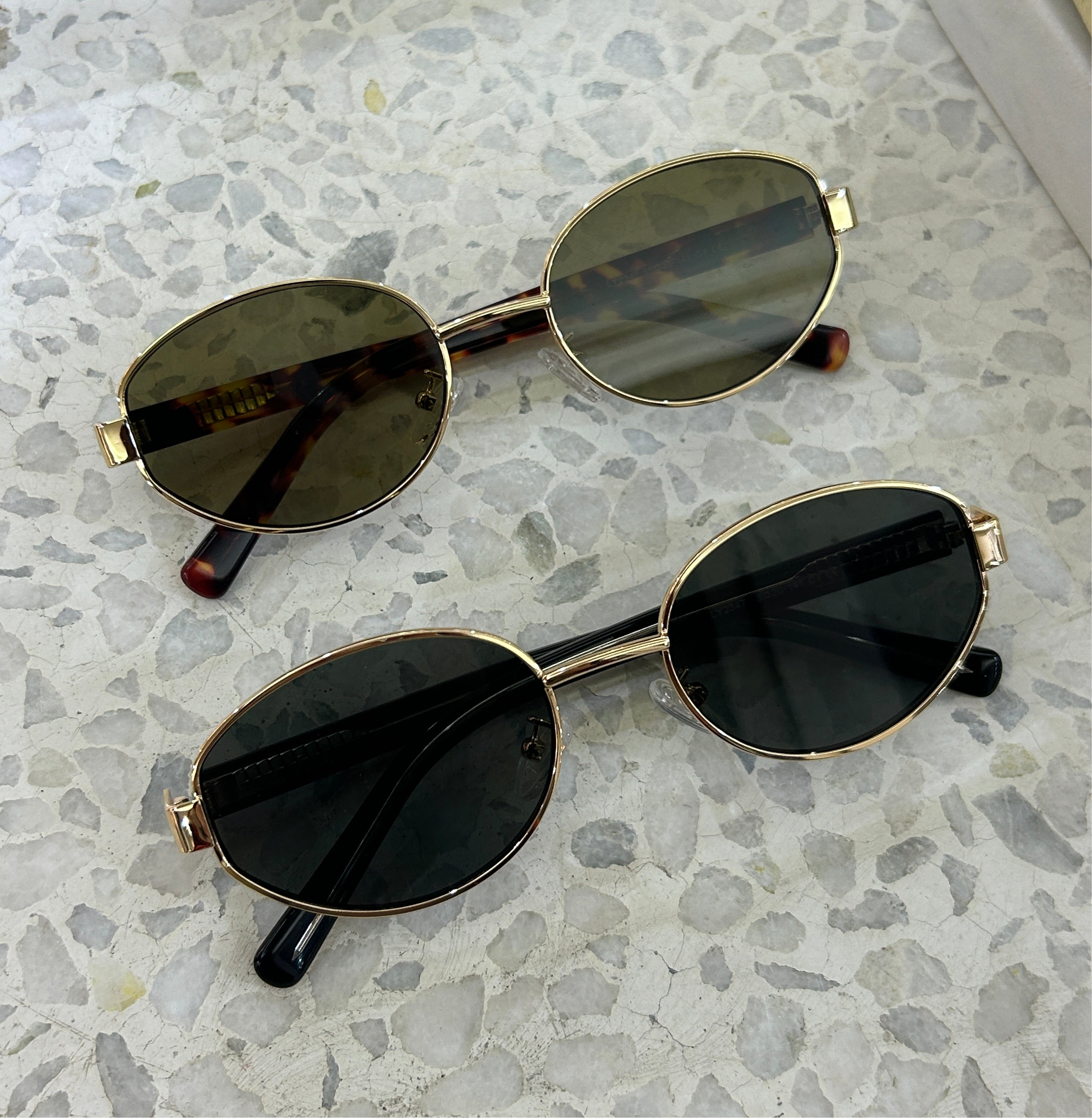 Pink Baby Hollis sunglasses with tortoise shell frames and dark lenses, stylish eyewear for sun protection.