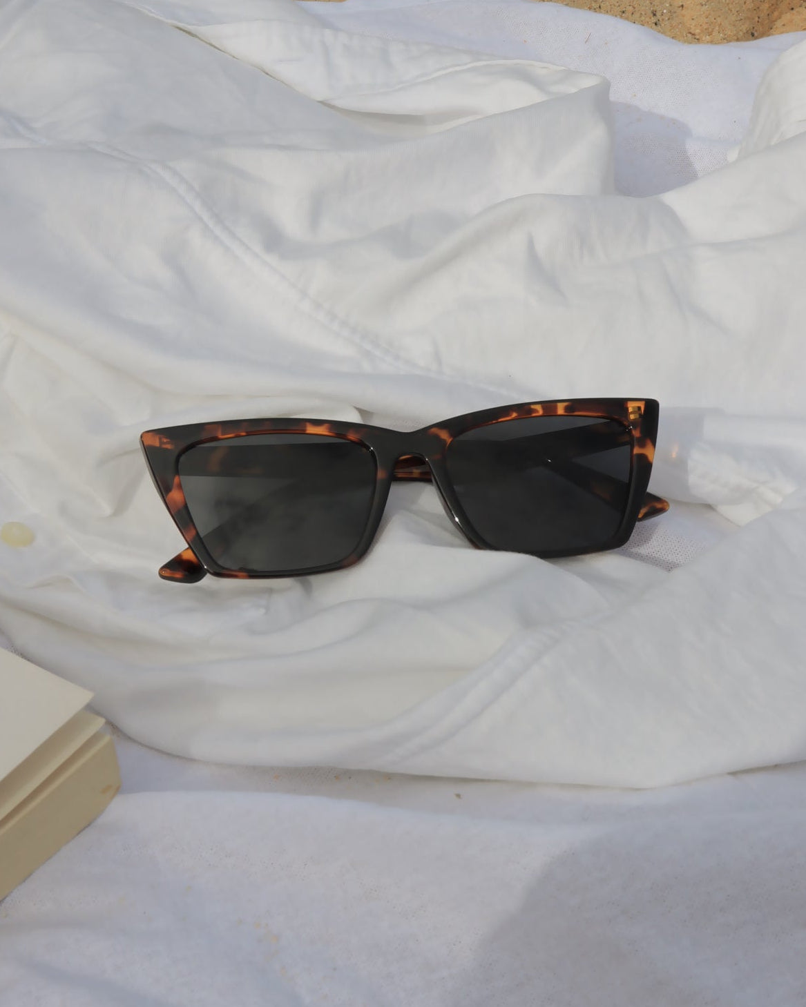 Pink Baby Levi sunglasses with round frames and tinted lenses, stylish eyewear for a trendy look.