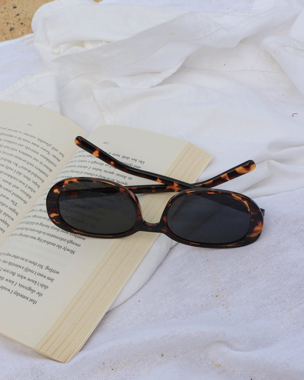 Pink Baby The Miller sunglasses with round tinted lenses and a pink frame, stylish and trendy eyewear for casual wear.