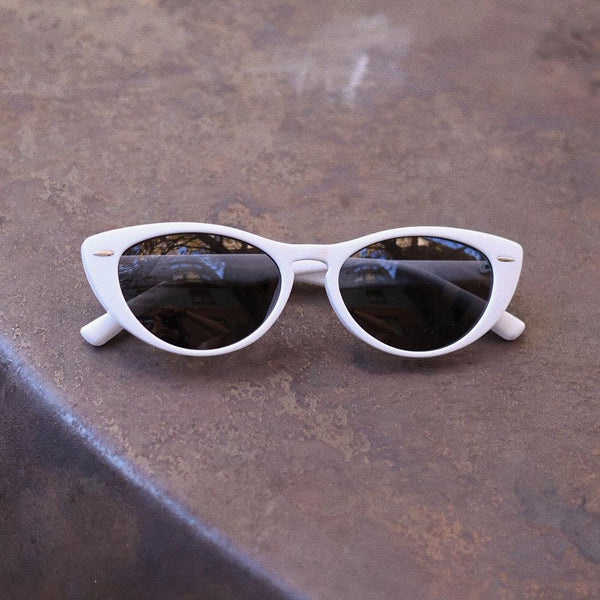 Pink Baby The Bailey white sunglasses with round frames and tinted lenses, stylish and protective for sunwear.