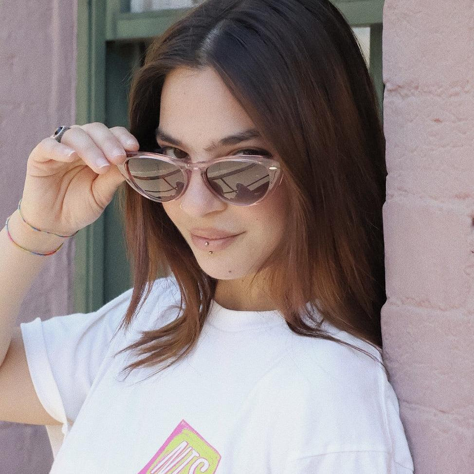 Pink Baby The Bailey pink sunglasses with rounded frames and tinted lenses, stylish accessory for sunny days.