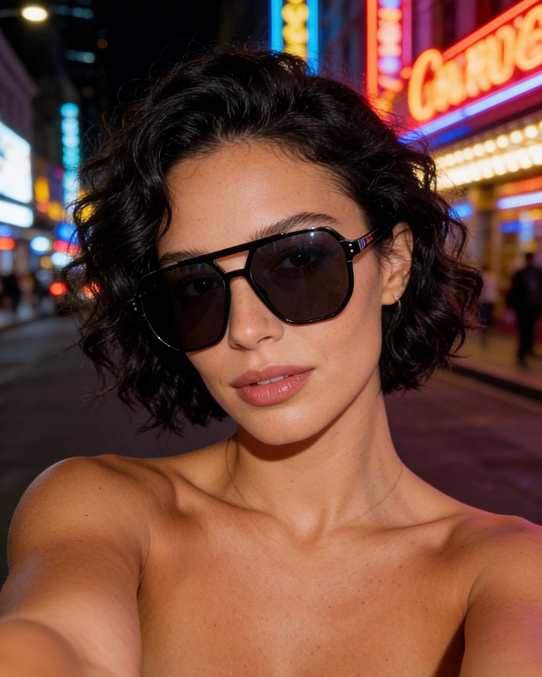 Pink Baby The Blake sunglasses with round black frames and tinted lenses, stylish eyewear for sunny days.
