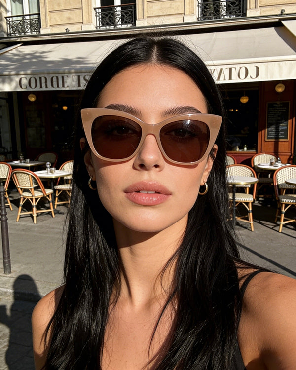 Pink Baby The Rylee cinnamon sunglasses with round frames and tinted lenses, shown on a neutral background.