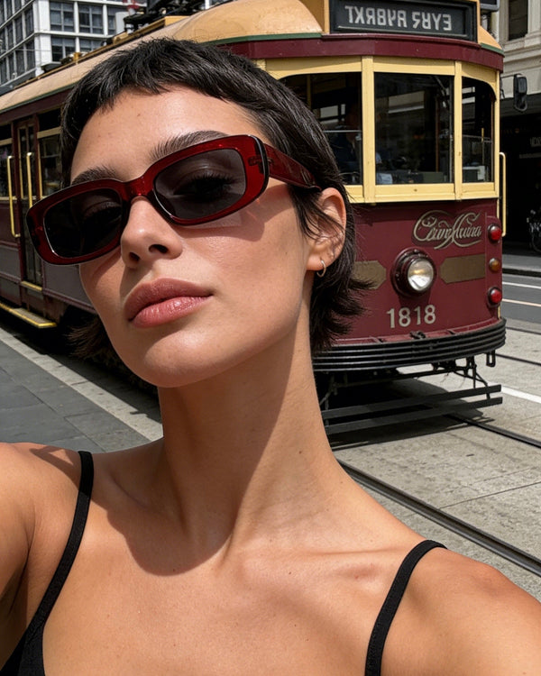 Pink Baby The Esme sunglasses with round tinted lenses and slim metal frames, stylish and protective eyewear for women.