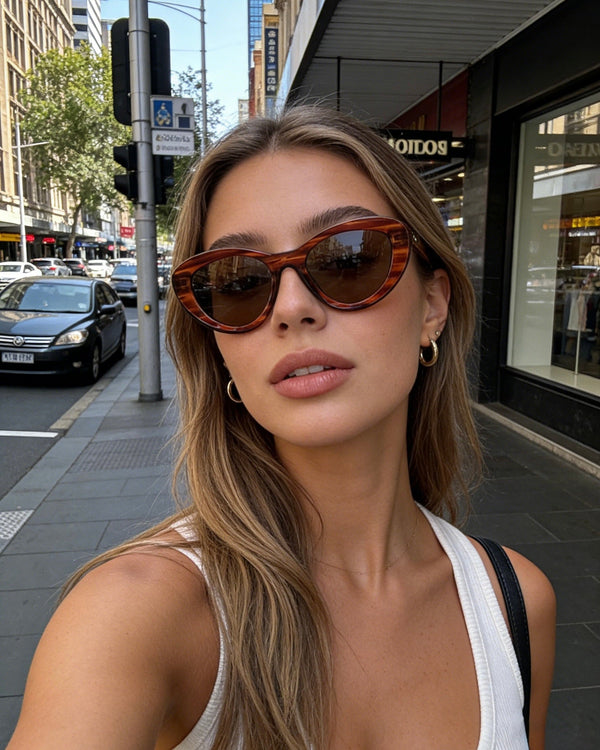 Pink Baby The Freesia red cateye polarized sunglasses with dark tinted lenses and stylish frame for sun protection.