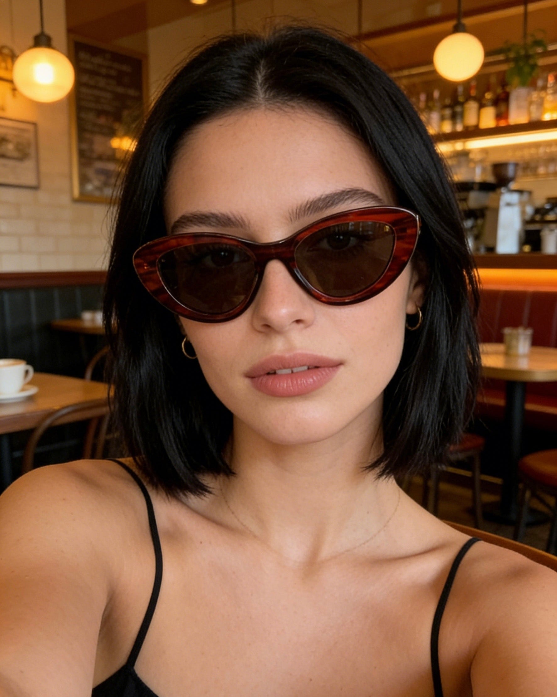 Pink Baby The Freesia red cateye polarized sunglasses with dark lenses and stylish frame for a fashionable look.
