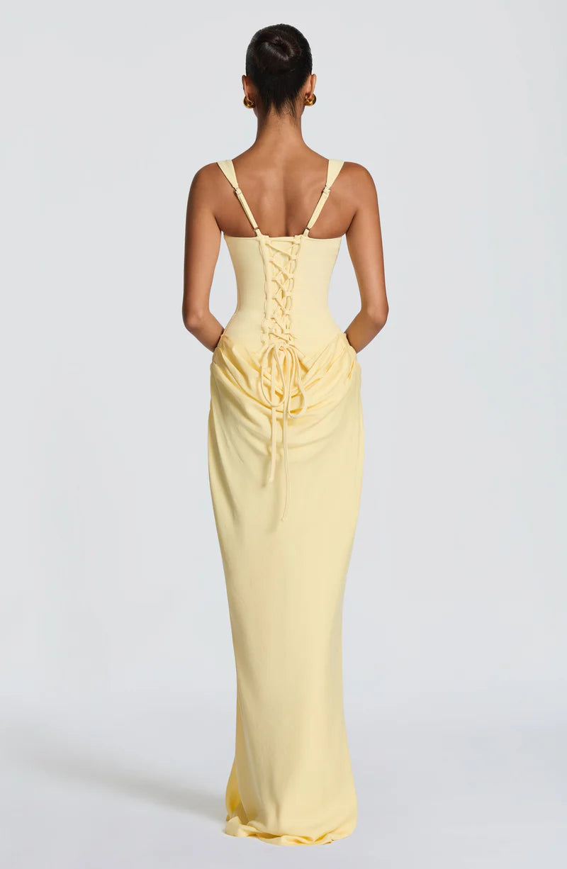 Pink Baby Lila Maxi Dress in Lemon color, featuring a flowing fabric and sleeveless design, perfect for summer occasions.