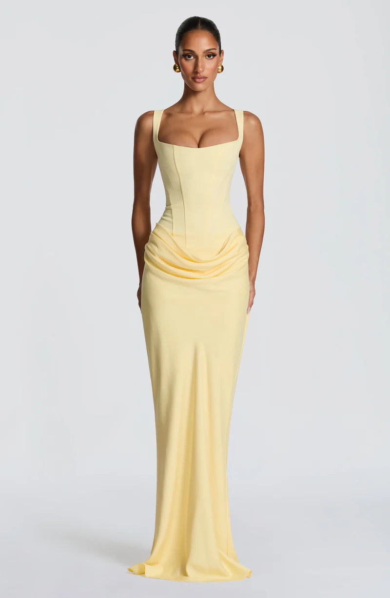 Pink Baby Lila Maxi Dress in lemon color, featuring a flowy design and sleeveless style, perfect for summer occasions.