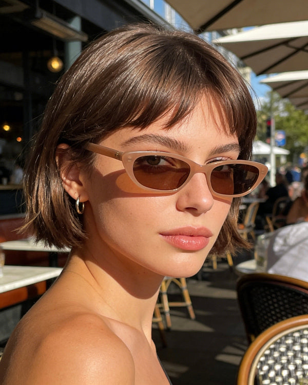 Pink Baby The Indie cinnamon sunglasses with round frames and tinted lenses, stylish and trendy eyewear for casual wear.