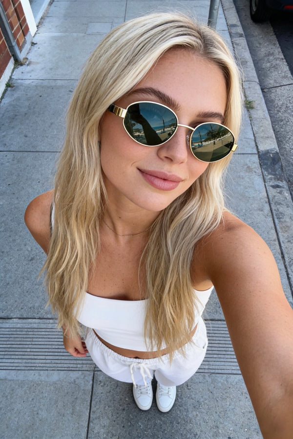 Pink Baby Hollis Black sunglasses with classic square frames and dark tinted lenses for stylish sun protection.