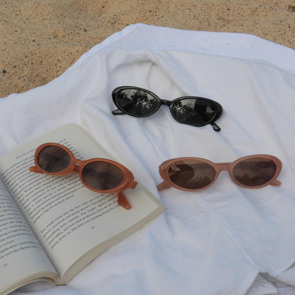 Pink Baby The Kyra polarized sunglasses in three colors with pumpkin-shaped frames for stylish sun protection.