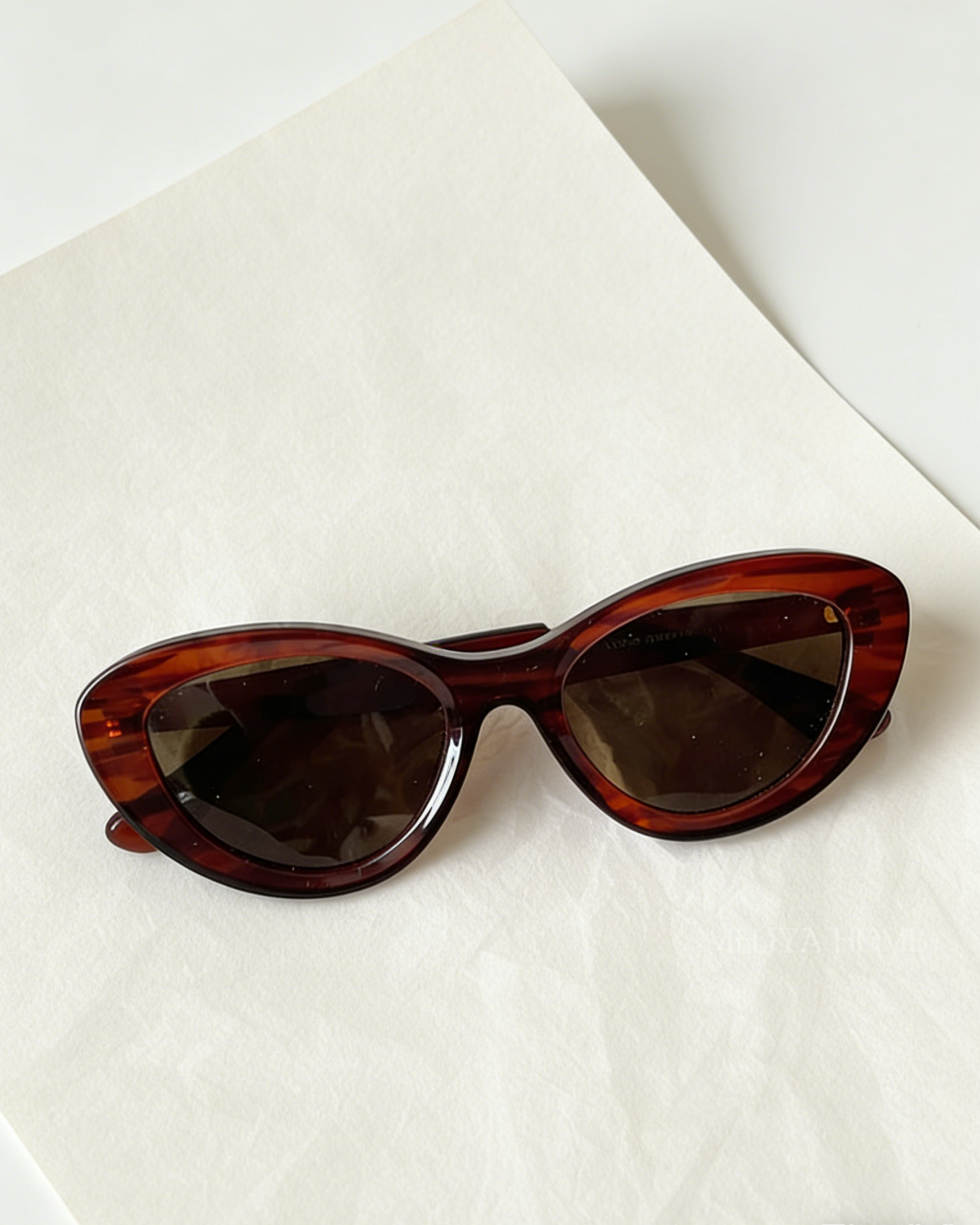 Pink Baby Freesia red cat-eye sunglasses with polarized lenses, stylish and protective eyewear for women.