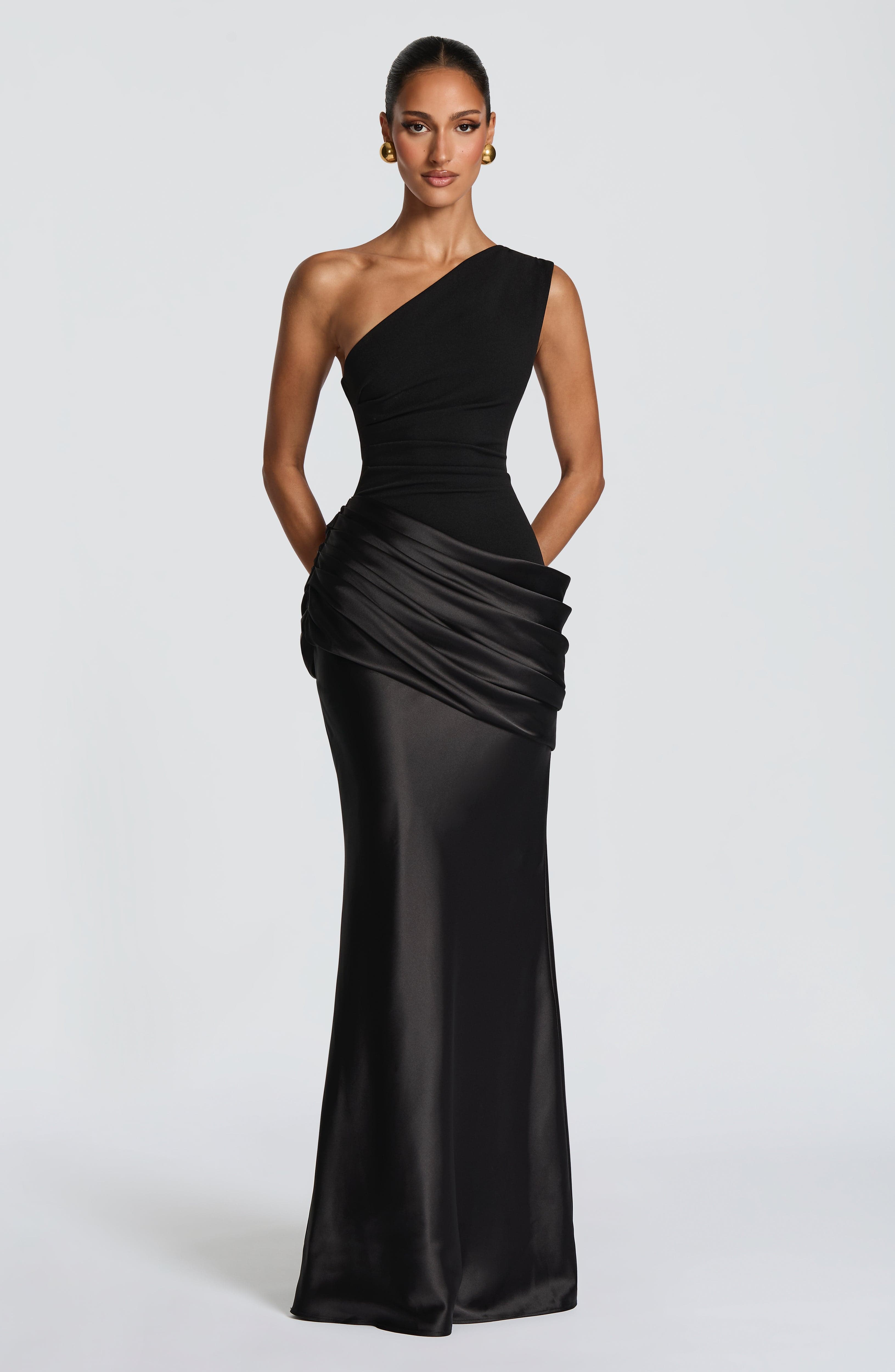 Black Sadona Maxi Dress by Pink Baby, featuring a flowing silhouette and elegant design, shown in size XS.