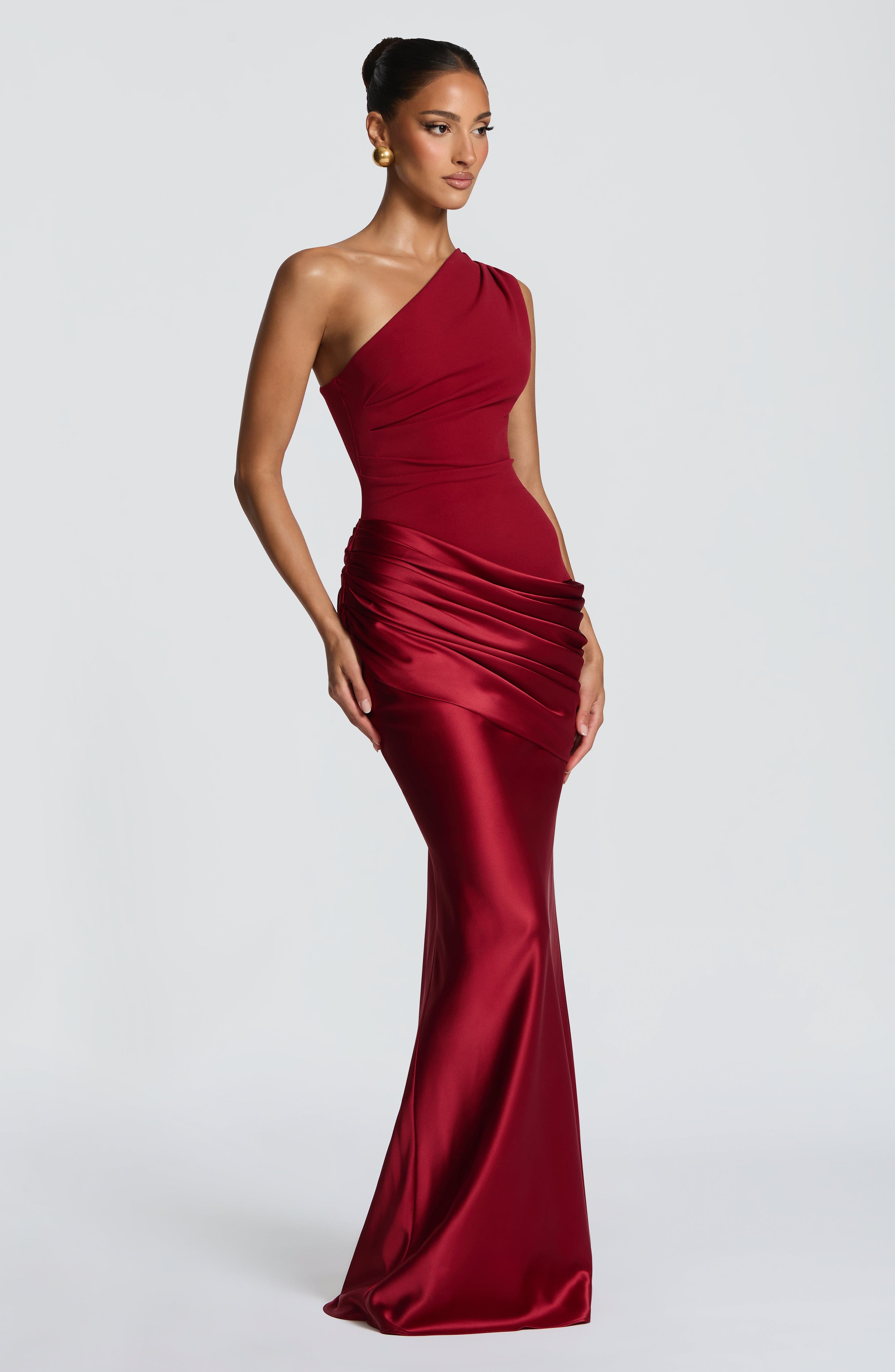 Pink Baby Sadona Maxi Dress in deep red, flowing fabric with a stylish design, perfect for elegant occasions.