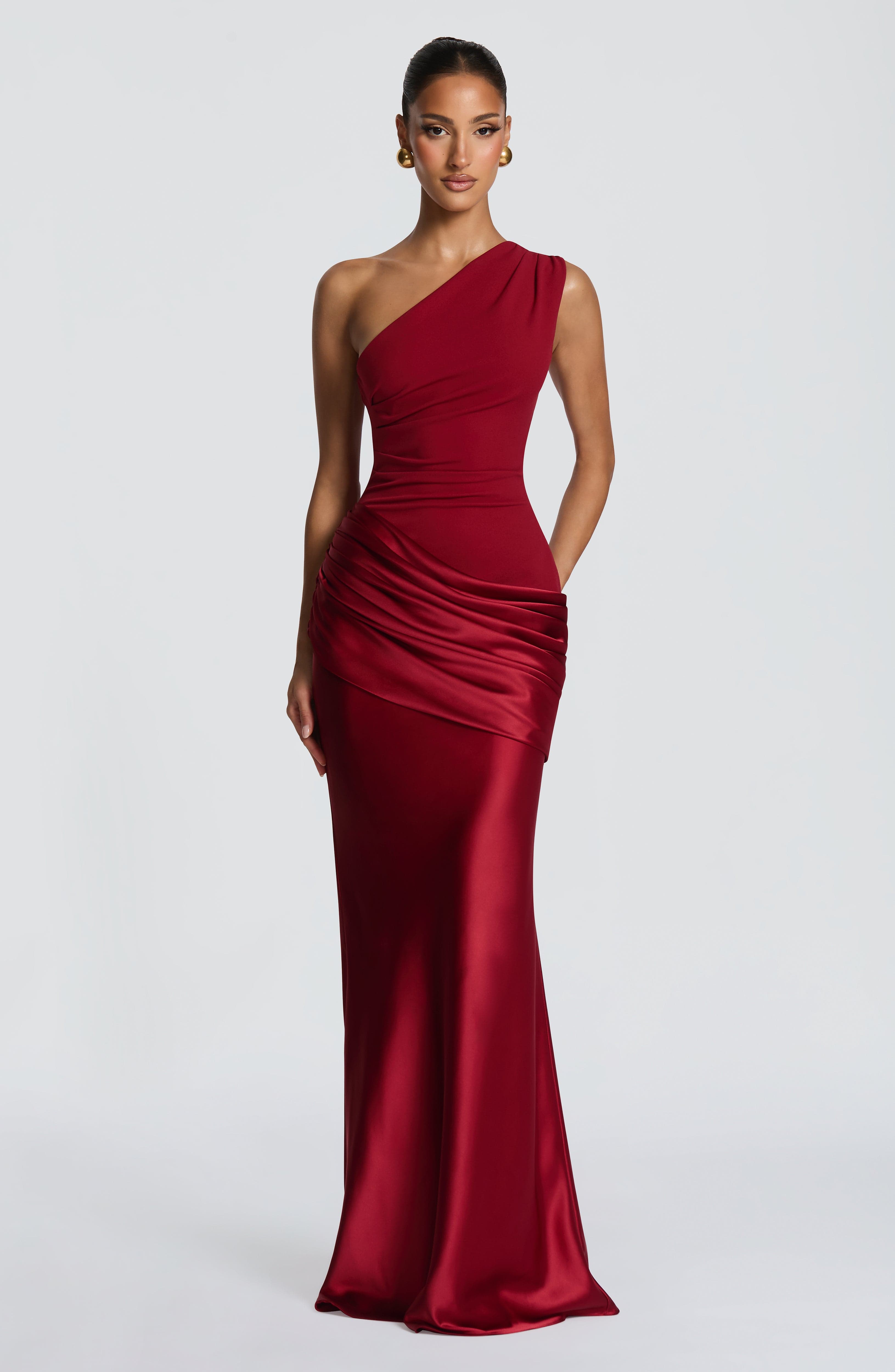 Pink Baby Sadona Maxi Dress in deep red, flowing fabric with a stylish design, perfect for elegant occasions.