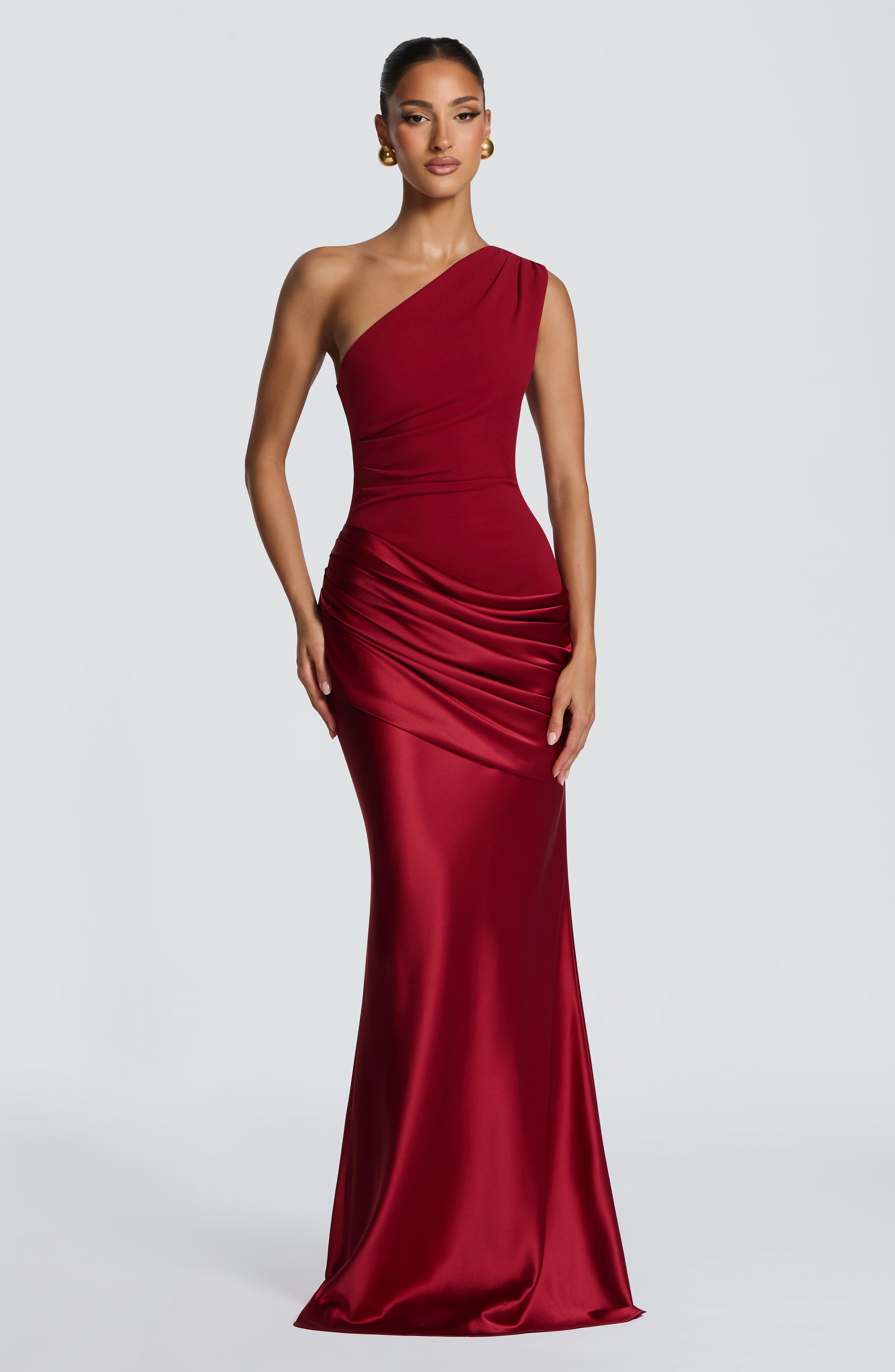 Deep red Sadona Maxi Dress by Pink Baby, featuring a flowing silhouette and elegant design, suitable for casual or formal occasions.