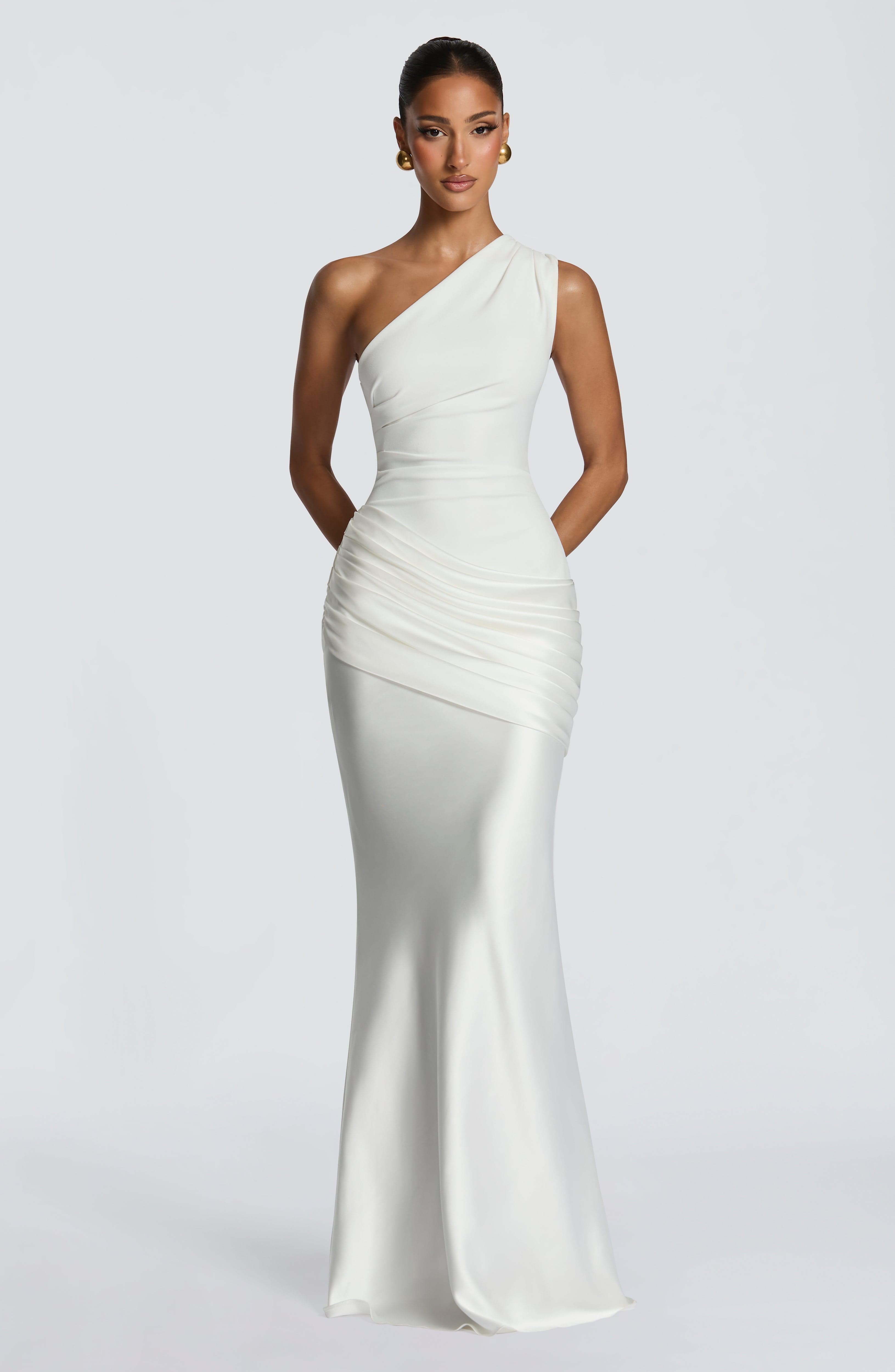 Ivory Sadona Maxi Dress by Pink Baby, flowing fabric with elegant design, perfect for special occasions or summer wear.
