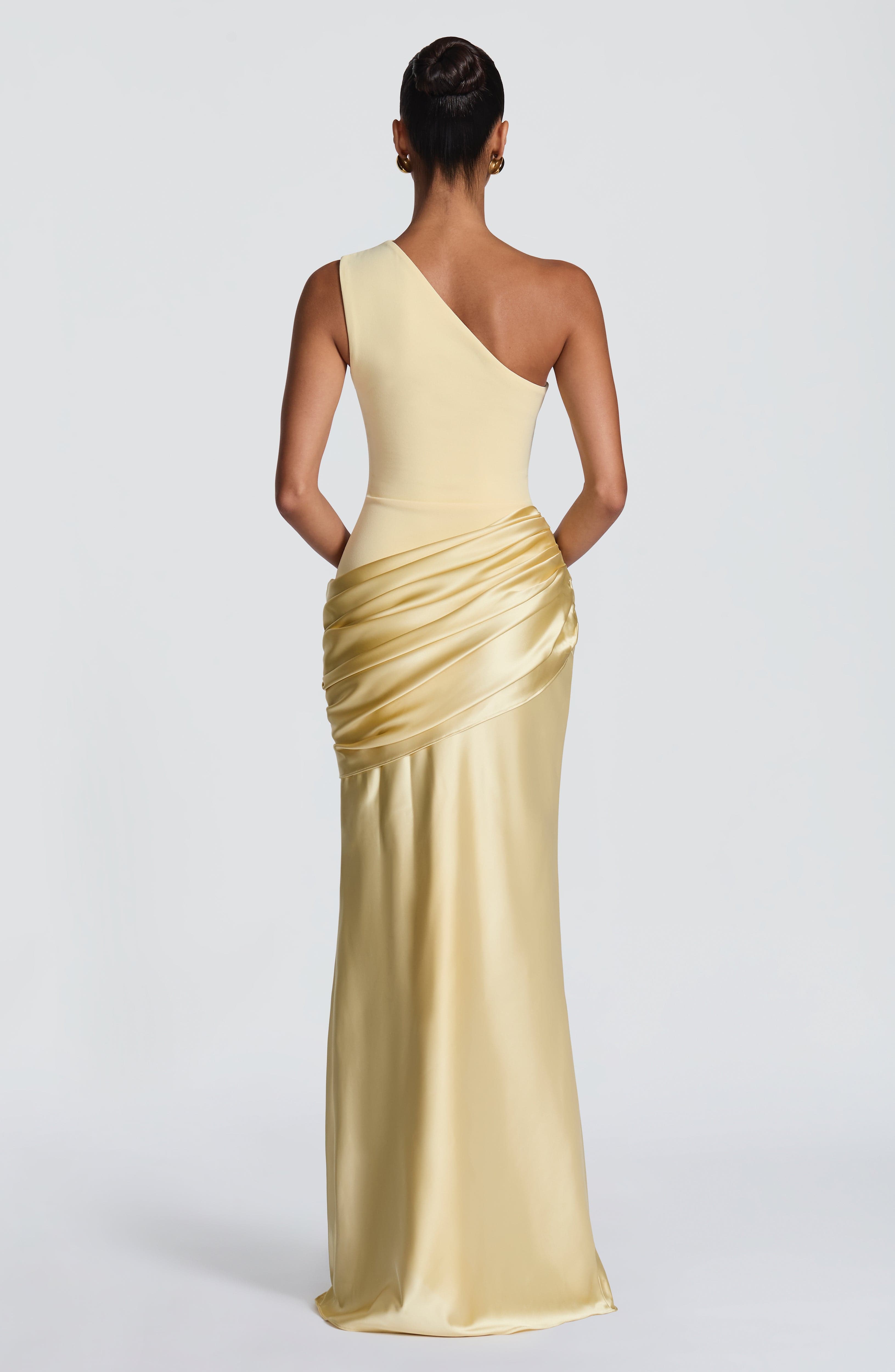 Pink Baby Sadona Maxi Dress in Lemon color, featuring flowy fabric and stylish design, perfect for warm weather and casual occasions.