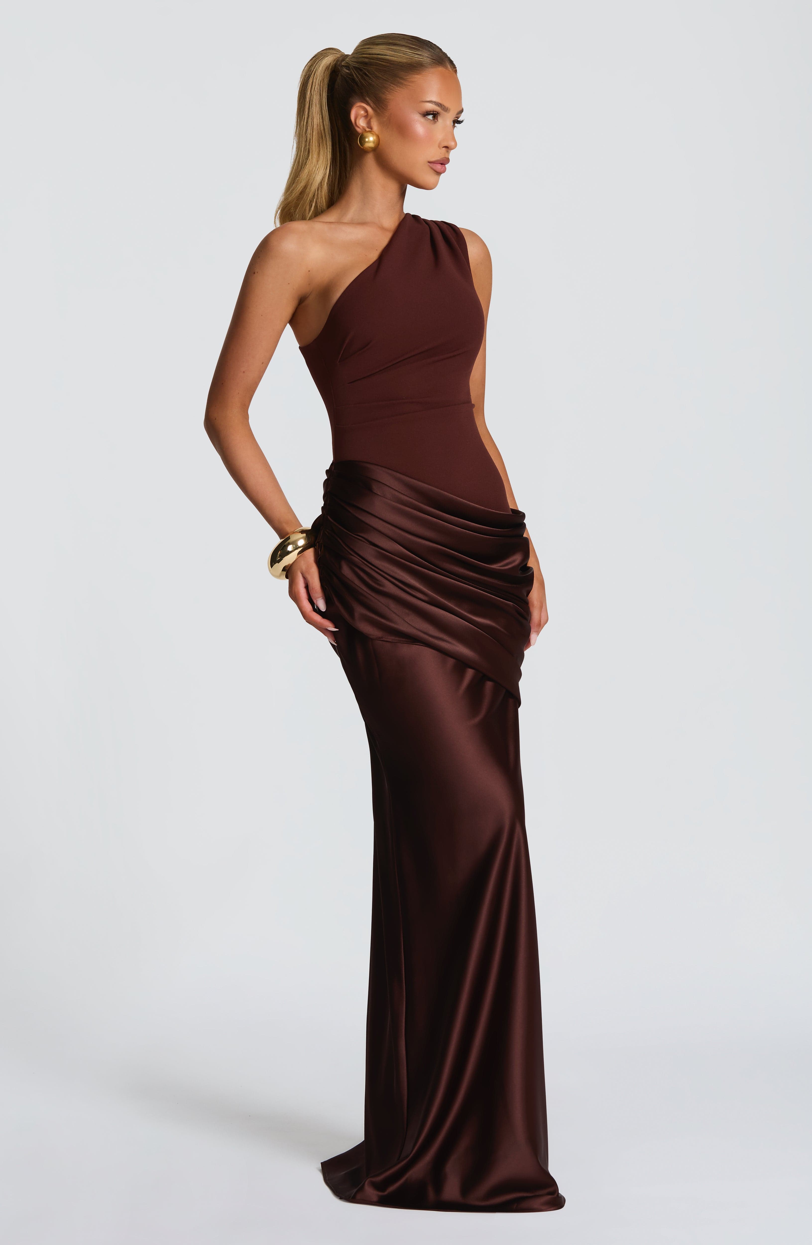 Pink Baby Sadona Maxi Dress in plum brown, featuring a flowing design and elegant style for stylish occasions.